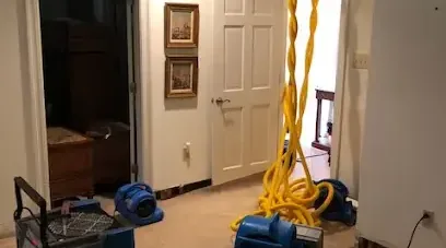 Restoration equipment set up to dry out a home after a water loss